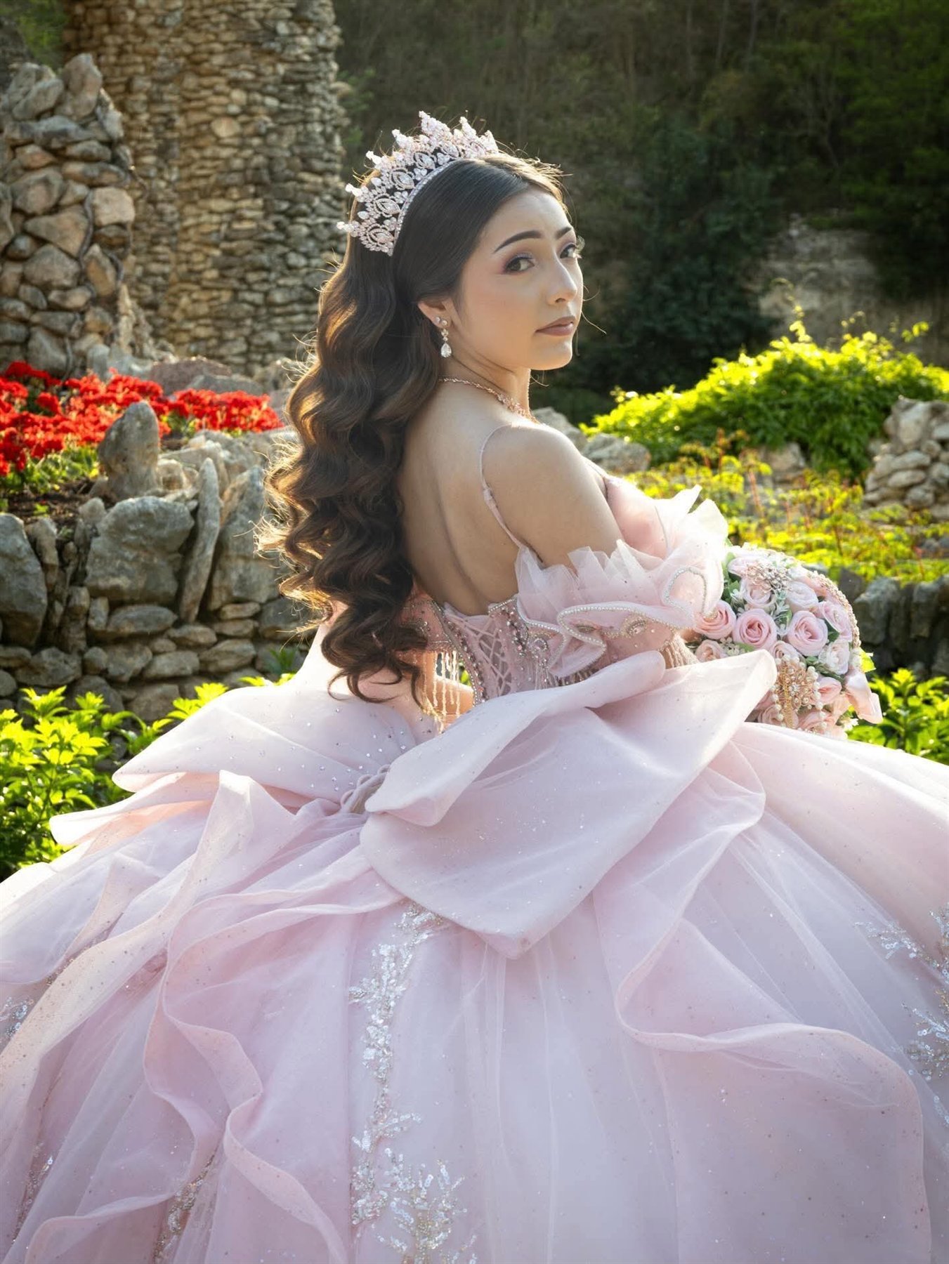 Quinceañera portrait in a pink gown